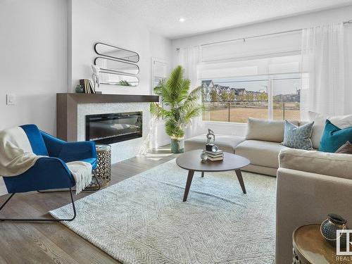 16808 33 Avenue, Edmonton, AB - Indoor Photo Showing Living Room With Fireplace