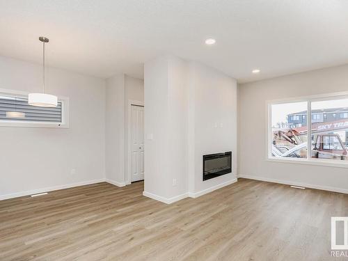 41 Gambel Loop, Spruce Grove, AB - Indoor Photo Showing Living Room With Fireplace