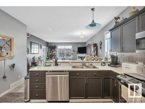 4 4908 43 Street, Legal, AB - Indoor Photo Showing Kitchen With Double Sink