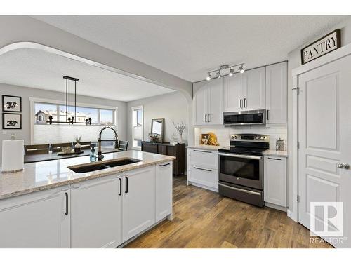 14957 135 Street, Edmonton, AB - Indoor Photo Showing Kitchen With Double Sink