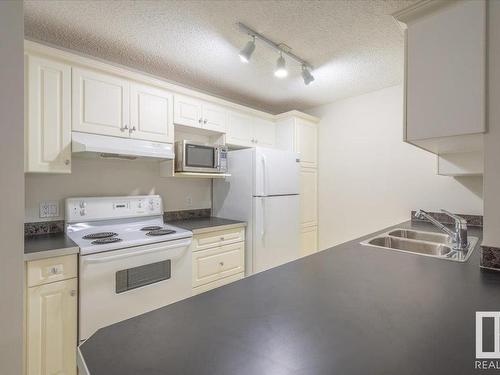 10511 42 Avenue, Edmonton, AB - Indoor Photo Showing Kitchen With Double Sink