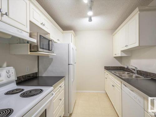 10511 42 Avenue, Edmonton, AB - Indoor Photo Showing Kitchen With Double Sink