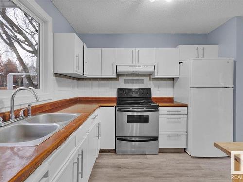 658 Lakewood Road, Edmonton, AB - Indoor Photo Showing Kitchen With Double Sink