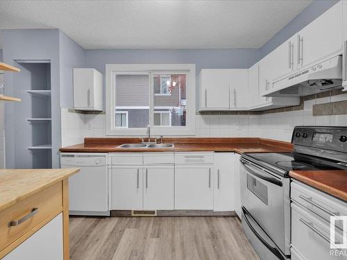 658 Lakewood Road, Edmonton, AB - Indoor Photo Showing Kitchen With Double Sink