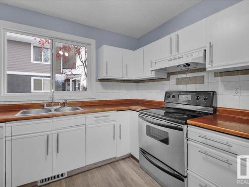 658 Lakewood Road, Edmonton, AB - Indoor Photo Showing Kitchen With Double Sink