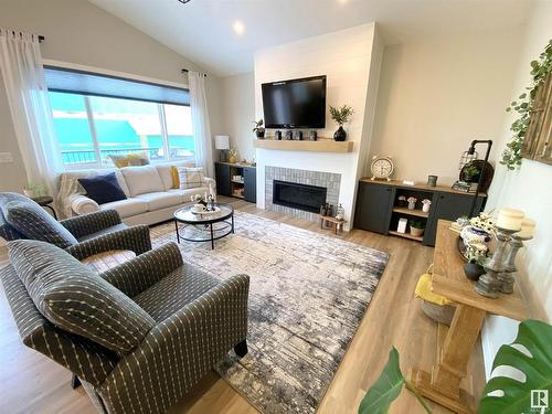 3 Holt Cove, Spruce Grove, AB - Indoor Photo Showing Living Room With Fireplace