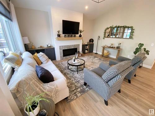 3 Holt Cove, Spruce Grove, AB - Indoor Photo Showing Living Room With Fireplace