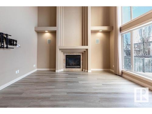 1021 Downey Way, Edmonton, AB - Indoor With Fireplace