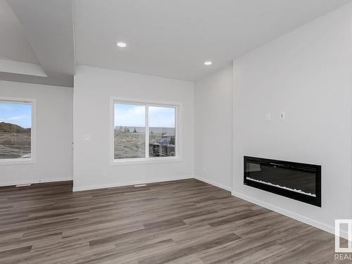 73 Chelles Wynd, St. Albert, AB - Indoor Photo Showing Other Room With Fireplace