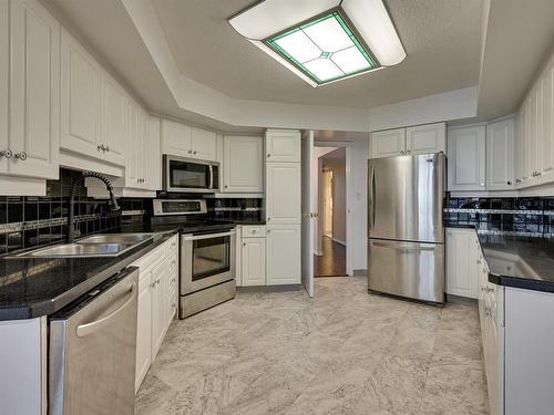 5A 10050 118 Street, Edmonton, AB - Indoor Photo Showing Kitchen With Stainless Steel Kitchen With Double Sink