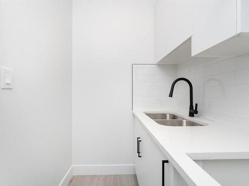 42 Wynn Road, Fort Saskatchewan, AB - Indoor Photo Showing Kitchen With Double Sink