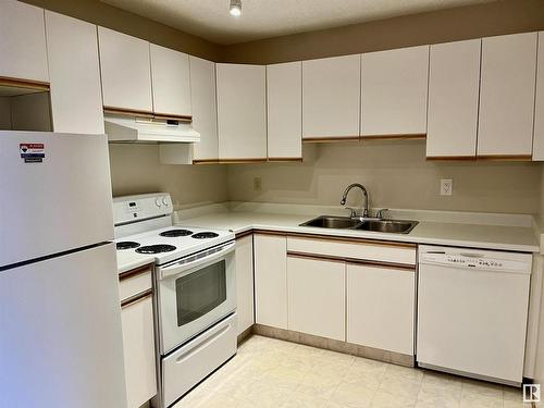 205 9985 93 Avenue, Fort Saskatchewan, AB - Indoor Photo Showing Kitchen With Double Sink