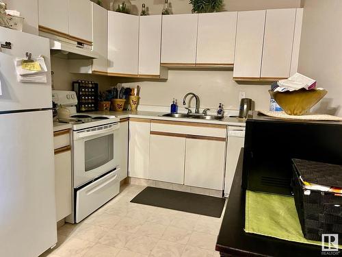 205 9985 93 Avenue, Fort Saskatchewan, AB - Indoor Photo Showing Kitchen With Double Sink