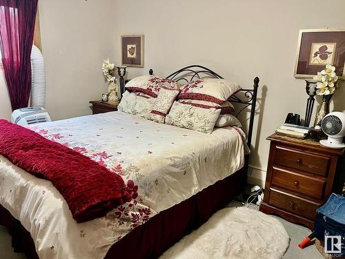 205 9985 93 Avenue, Fort Saskatchewan, AB - Indoor Photo Showing Bedroom