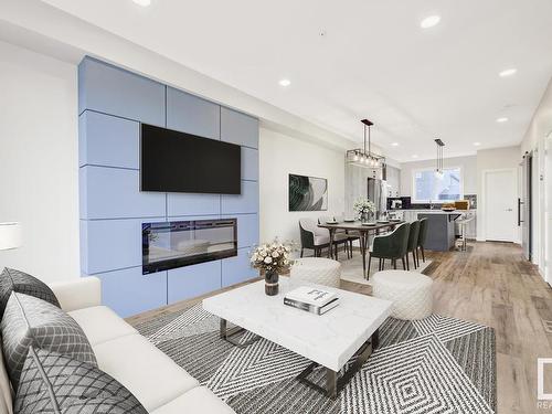 8063 Cedric Mah Road, Edmonton, AB - Indoor Photo Showing Living Room With Fireplace