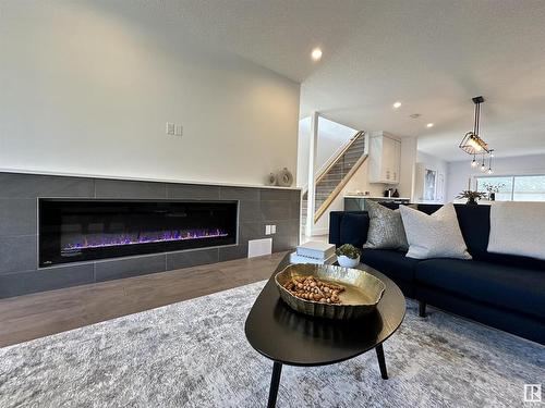 8420 117 Street, Edmonton, AB - Indoor Photo Showing Living Room With Fireplace