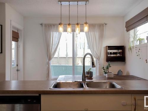 48 Vaughn Avenue, Spruce Grove, AB - Indoor Photo Showing Kitchen With Double Sink