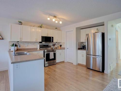 48 Vaughn Avenue, Spruce Grove, AB - Indoor Photo Showing Kitchen With Double Sink