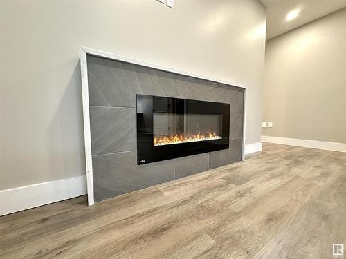 8422 117 Street, Edmonton, AB - Indoor Photo Showing Living Room With Fireplace