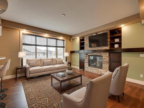 5258 Mullen Crest, Edmonton, AB - Indoor Photo Showing Living Room With Fireplace