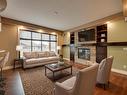 5258 Mullen Crest, Edmonton, AB  - Indoor Photo Showing Living Room With Fireplace 