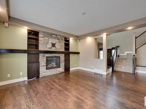 5258 Mullen Crest, Edmonton, AB - Indoor Photo Showing Living Room With Fireplace