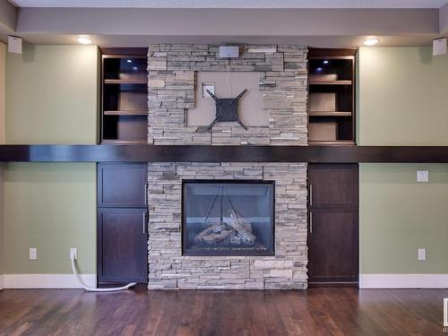 5258 Mullen Crest, Edmonton, AB - Indoor Photo Showing Living Room With Fireplace