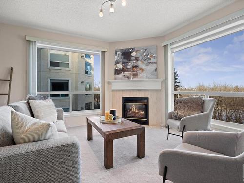 407 75 Gervais Road, St. Albert, AB - Indoor Photo Showing Living Room With Fireplace