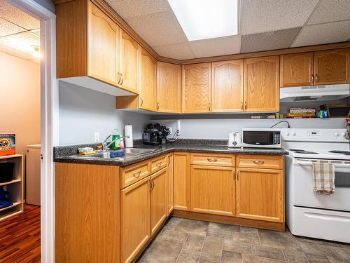 4301A 48 Street, Leduc, AB - Indoor Photo Showing Kitchen With Double Sink