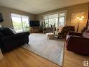 211 10935 21 Avenue, Edmonton, AB  - Indoor Photo Showing Living Room 