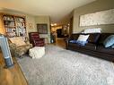 211 10935 21 Avenue, Edmonton, AB  - Indoor Photo Showing Living Room 