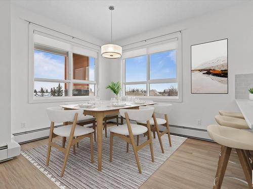 303 17 Columbia Avenue, Devon, AB - Indoor Photo Showing Dining Room