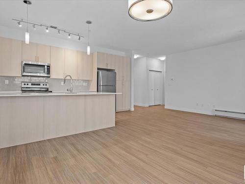 303 17 Columbia Avenue, Devon, AB - Indoor Photo Showing Kitchen With Upgraded Kitchen