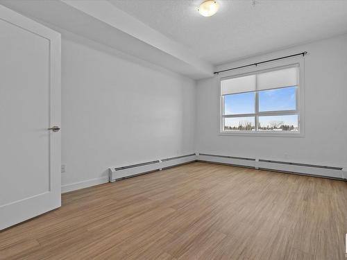 303 17 Columbia Avenue, Devon, AB - Indoor Photo Showing Other Room