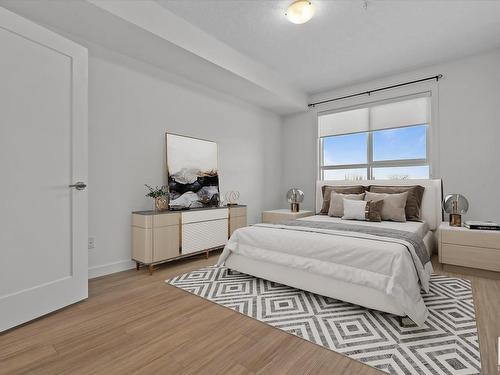 303 17 Columbia Avenue, Devon, AB - Indoor Photo Showing Bedroom