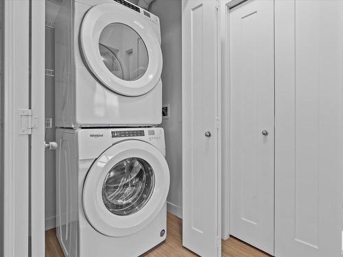 303 17 Columbia Avenue, Devon, AB - Indoor Photo Showing Laundry Room