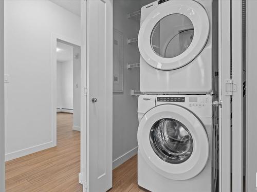 303 17 Columbia Avenue, Devon, AB - Indoor Photo Showing Laundry Room