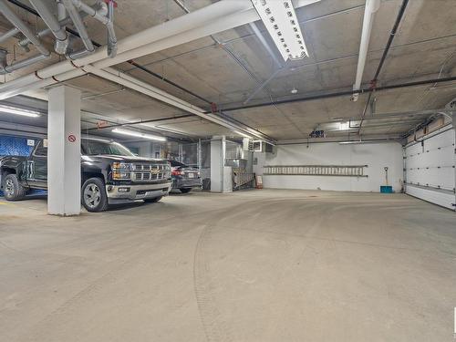 303 17 Columbia Avenue, Devon, AB - Indoor Photo Showing Garage