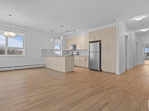 303 17 Columbia Avenue, Devon, AB - Indoor Photo Showing Kitchen With Stainless Steel Kitchen