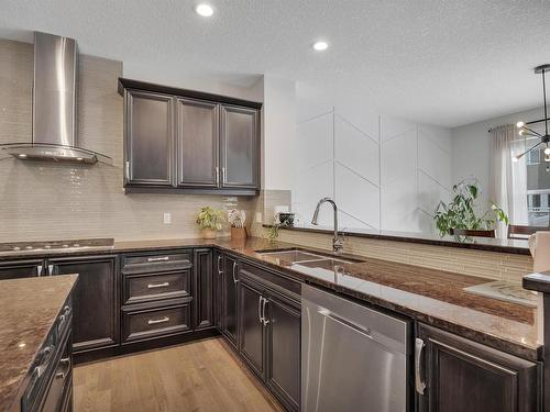 181 Sheppard Circle, Leduc, AB - Indoor Photo Showing Kitchen With Double Sink With Upgraded Kitchen