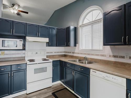 8321 171A Avenue, Edmonton, AB - Indoor Photo Showing Kitchen With Double Sink