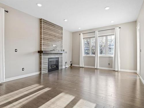 1803 Ainslie Court, Edmonton, AB - Indoor Photo Showing Living Room With Fireplace