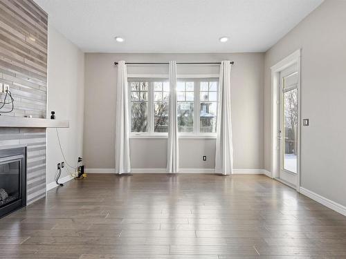 1803 Ainslie Court, Edmonton, AB - Indoor Photo Showing Living Room With Fireplace