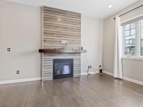 1803 Ainslie Court, Edmonton, AB - Indoor Photo Showing Living Room With Fireplace