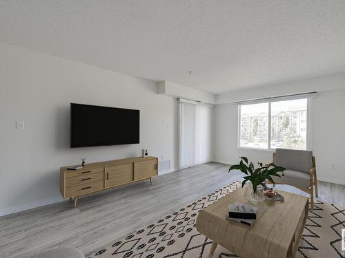 309 8117 114 Avenue, Edmonton, AB - Indoor Photo Showing Living Room