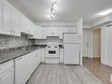 309 8117 114 Avenue, Edmonton, AB  - Indoor Photo Showing Kitchen With Double Sink 