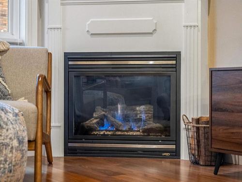 10232 115 Street, Edmonton, AB - Indoor Photo Showing Living Room With Fireplace