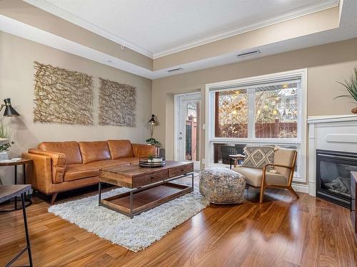 10232 115 Street, Edmonton, AB - Indoor Photo Showing Living Room With Fireplace