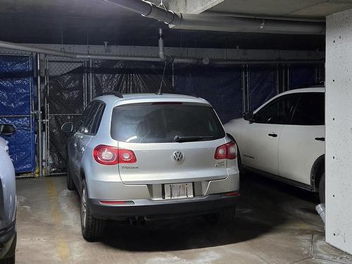 113 13111 140 Avenue, Edmonton, AB - Indoor Photo Showing Garage