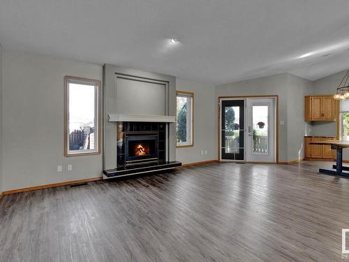 5302 59 Avenue, Vegreville, AB - Indoor Photo Showing Living Room With Fireplace